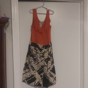 Tabitha orange and animal print dress.